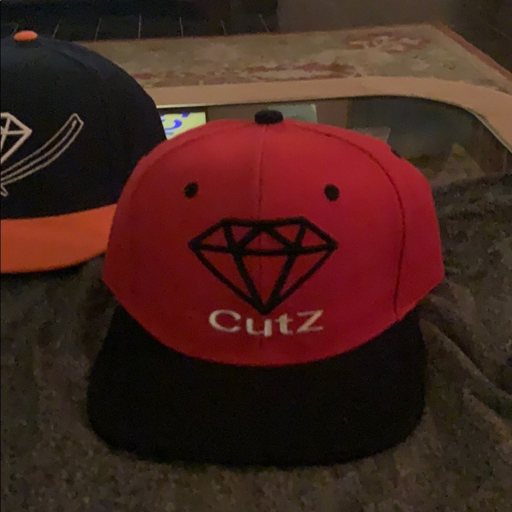Red and Black Diamond CutZ Hat in new condition